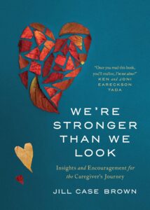 Book cover of "We're Stronger Than We Look" by Jill Case Brown. White text on teal background, features hearts, one beige, one red, and one made of leaves